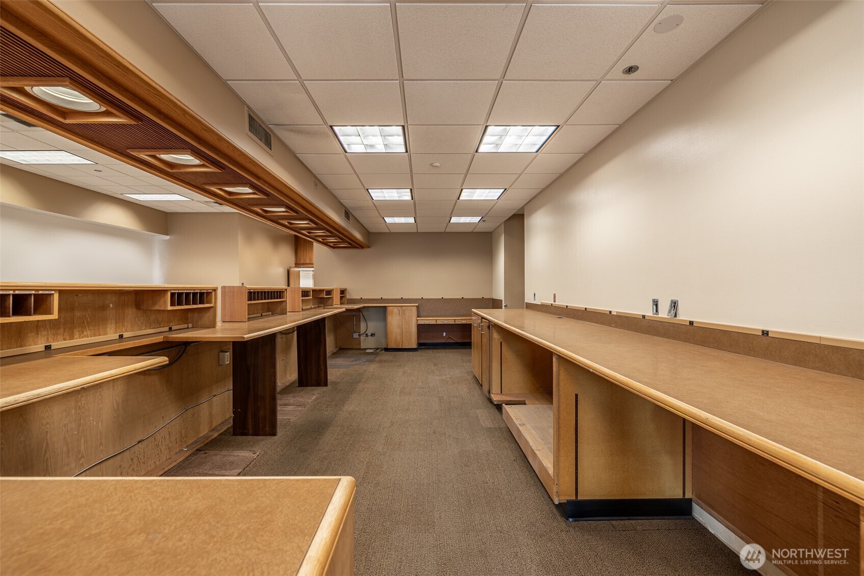 30 South Mission Street, Unit B Wenatchee, WA 98801 - Photo 11 of 16 a large kitchen with lots of counter space and wooden floor