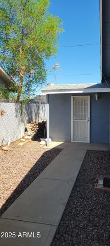 a view of swimming pool with a yard