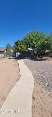 a view of a house with a ocean view