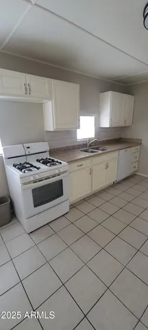 a bathroom with a toilet sink and bathtub