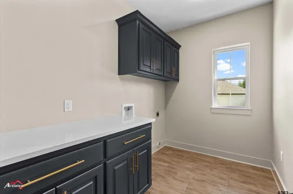 a bathroom with a sink vanity and a mirror