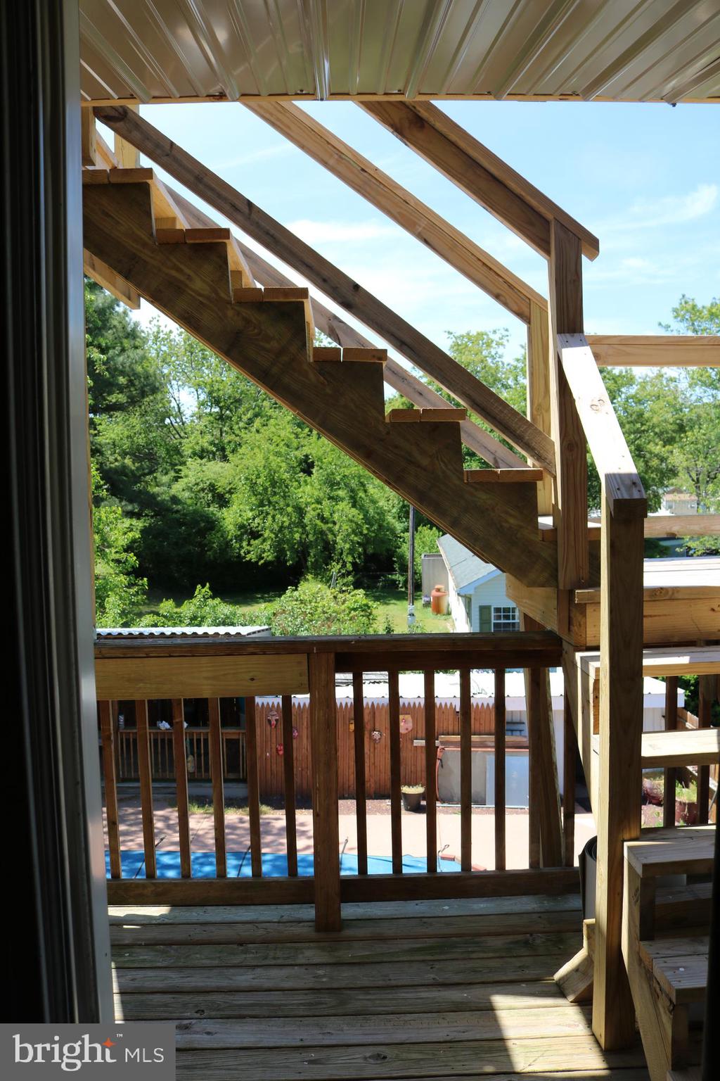 35655 Wolfe Neck Road Rehoboth Beach, DE 19971 - Photo 38 of 60 Master Bedroom Deck and access to 3rd Floor