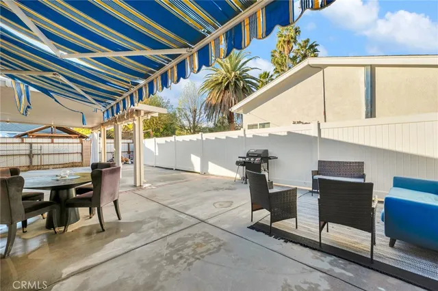 a view of a street with a building in the background