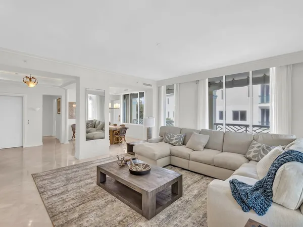 a living room with furniture and a couch