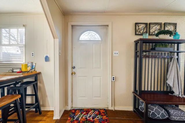 a view of a street sign on a sidewalk