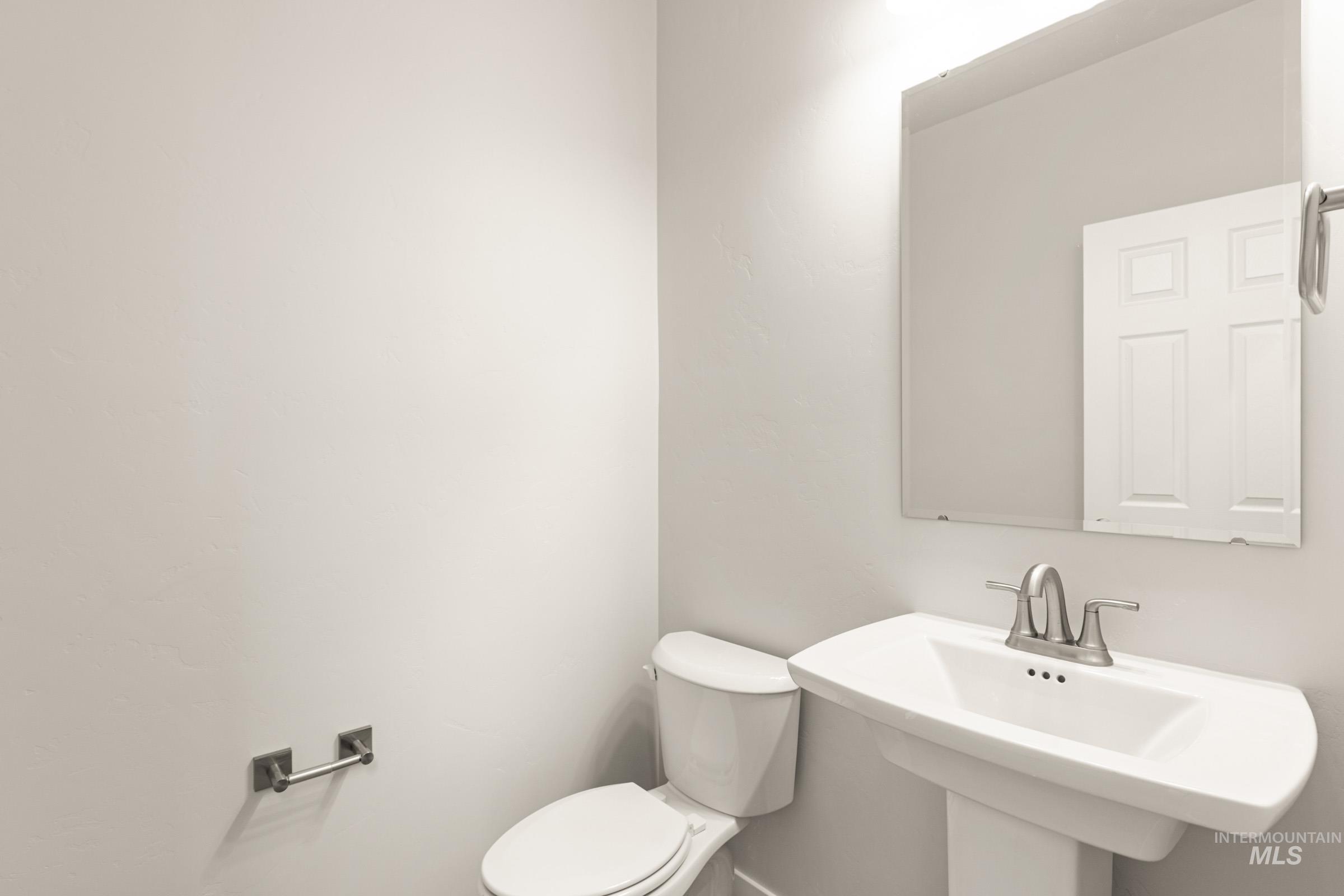 13688 Redway Court Caldwell, ID 83607 - Photo 12 of 26 Bathroom featuring toilet and a sink