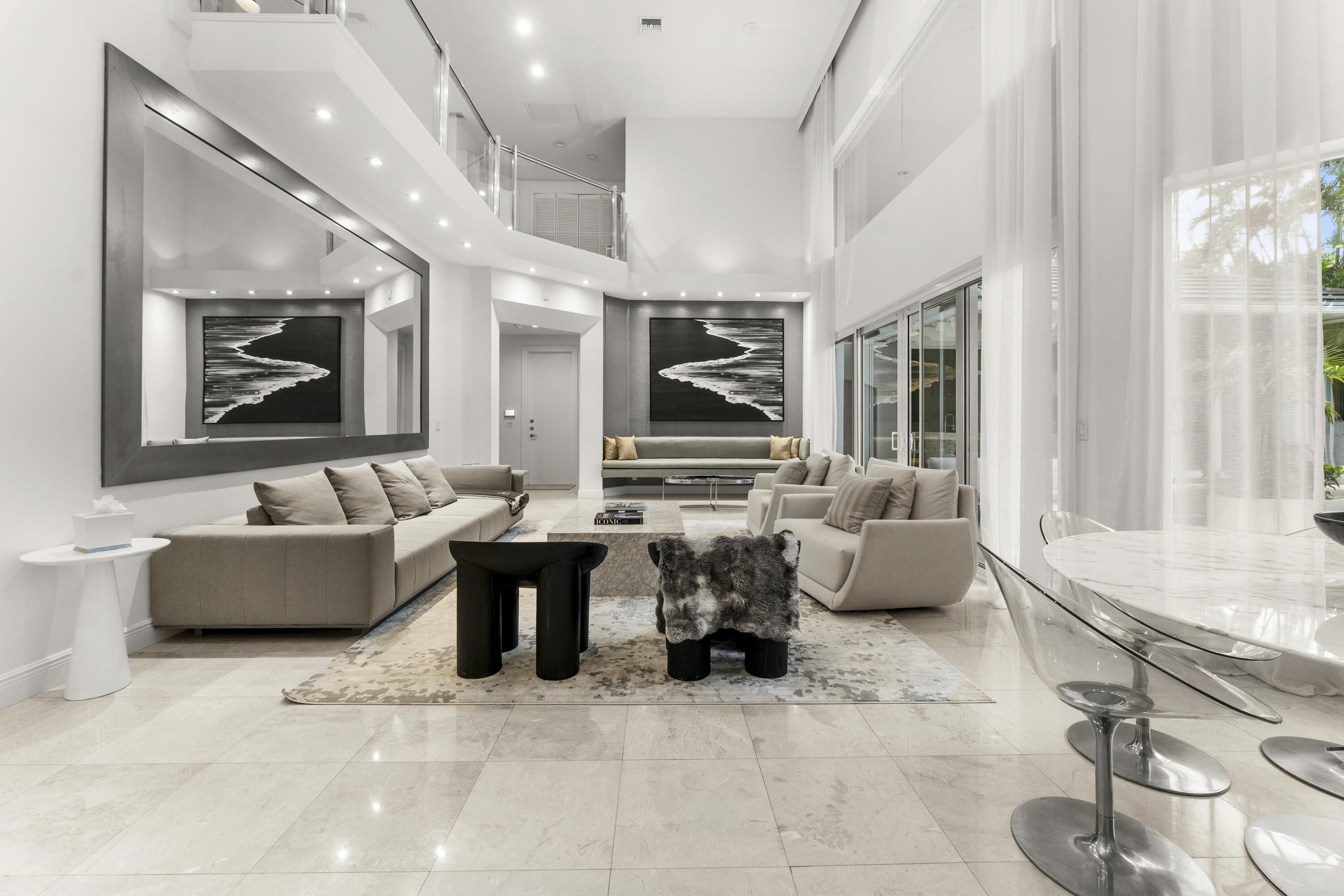 3156 Northwest 61st Street Boca Raton, FL 33496 - Photo 21 of 46 a living room with furniture and a large window
