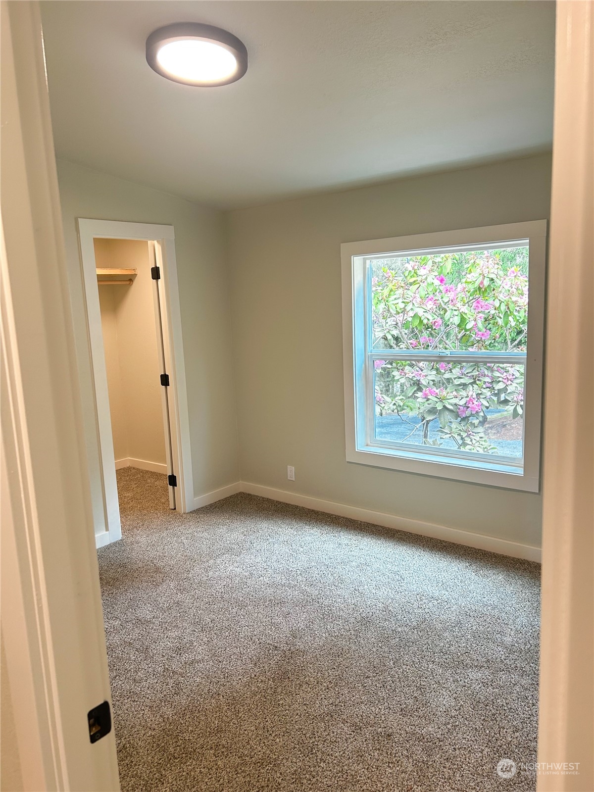 112 Levig Road Port Angeles, WA 98362 - Photo 12 of 37 an empty room with a window