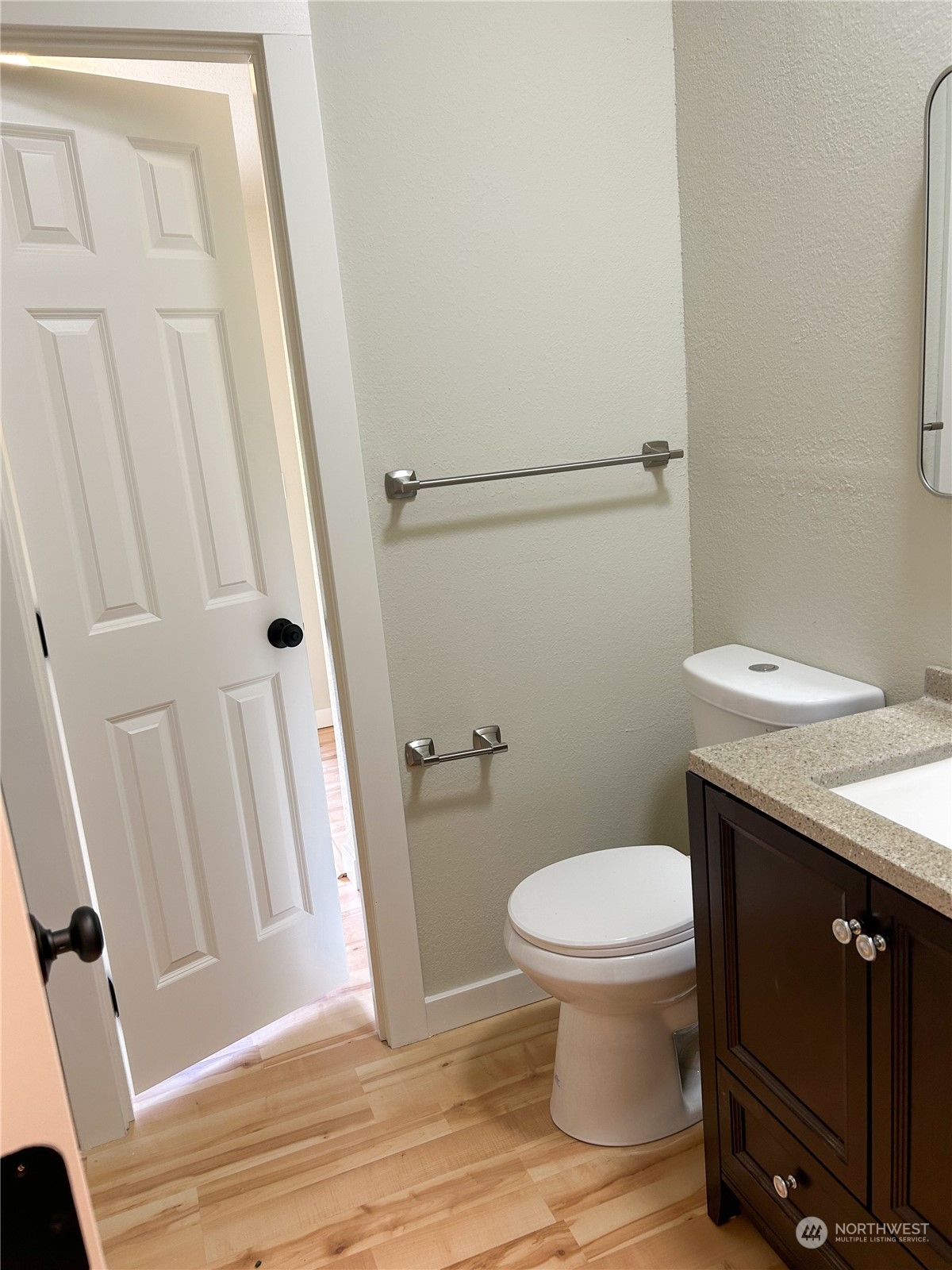 112 Levig Road Port Angeles, WA 98362 - Photo 14 of 37 a bathroom with a granite countertop toilet and a sink