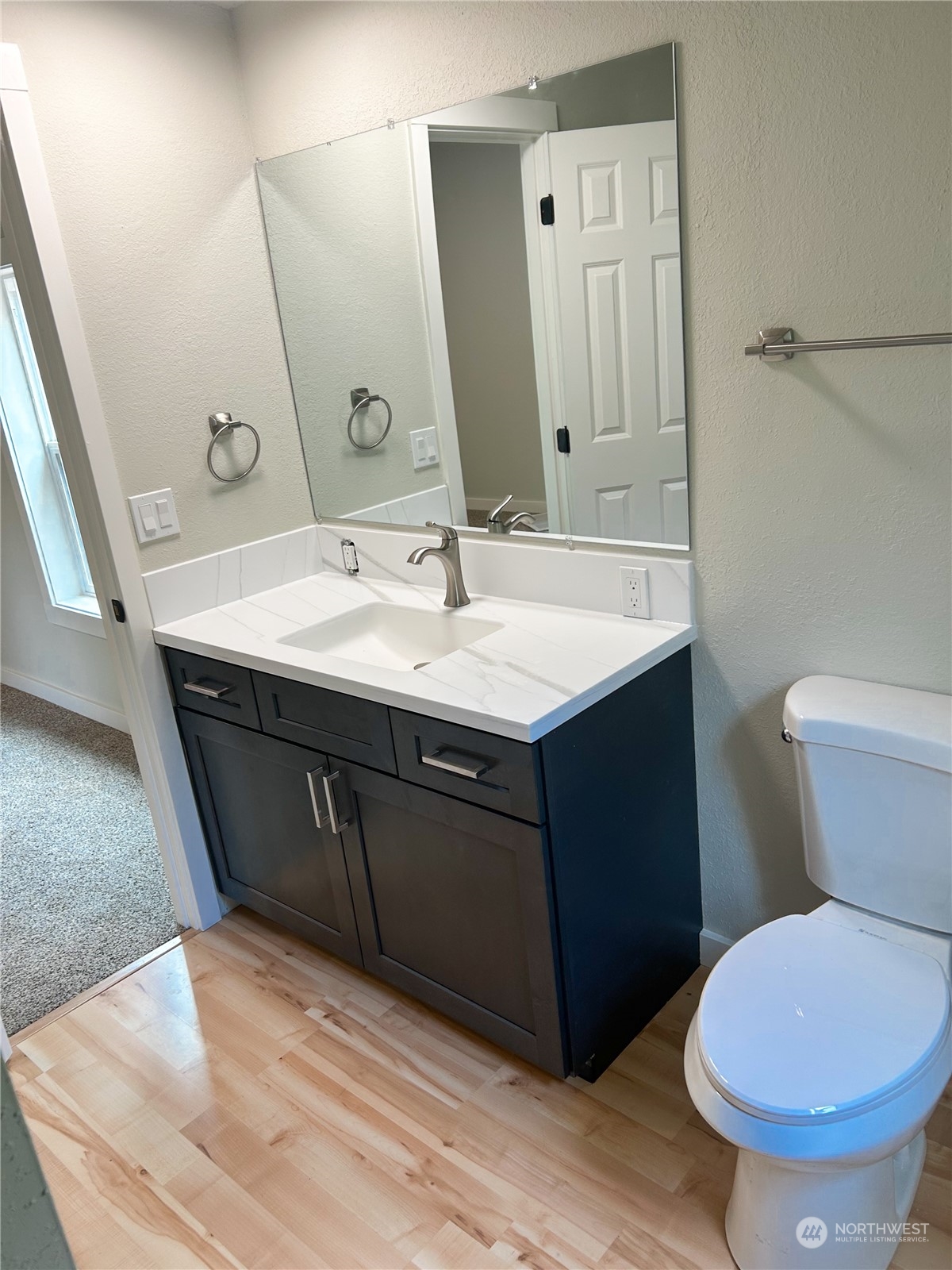 112 Levig Road Port Angeles, WA 98362 - Photo 26 of 37 a bathroom with a sink and a mirror