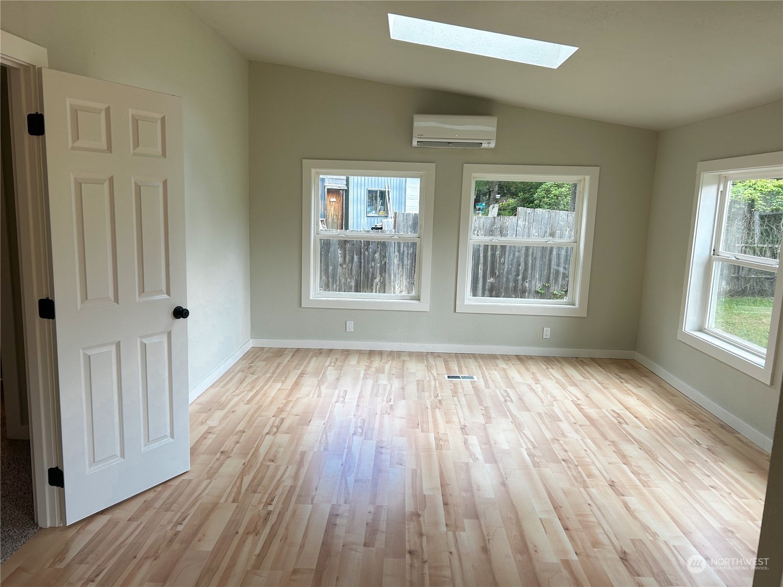 112 Levig Road Port Angeles, WA 98362 - Photo 29 of 37 an empty room with wooden floor and windows