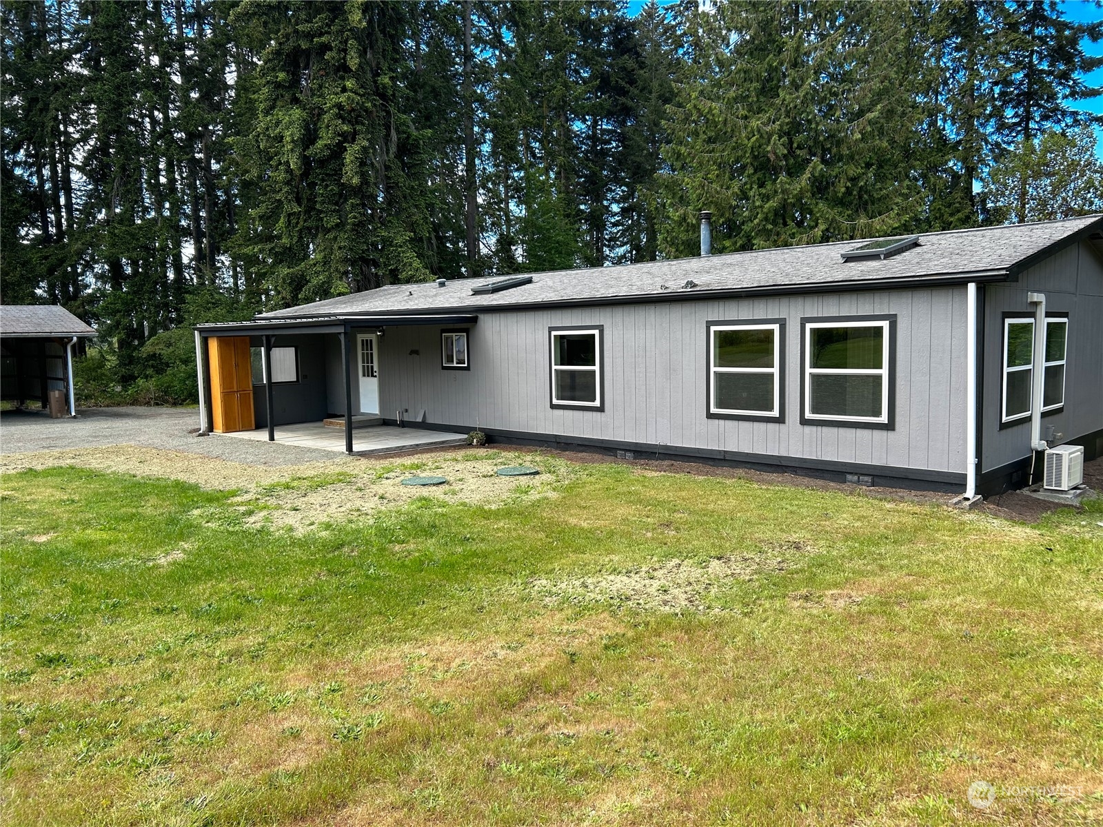 112 Levig Road Port Angeles, WA 98362 - Photo 31 of 37 a house with trees in the background