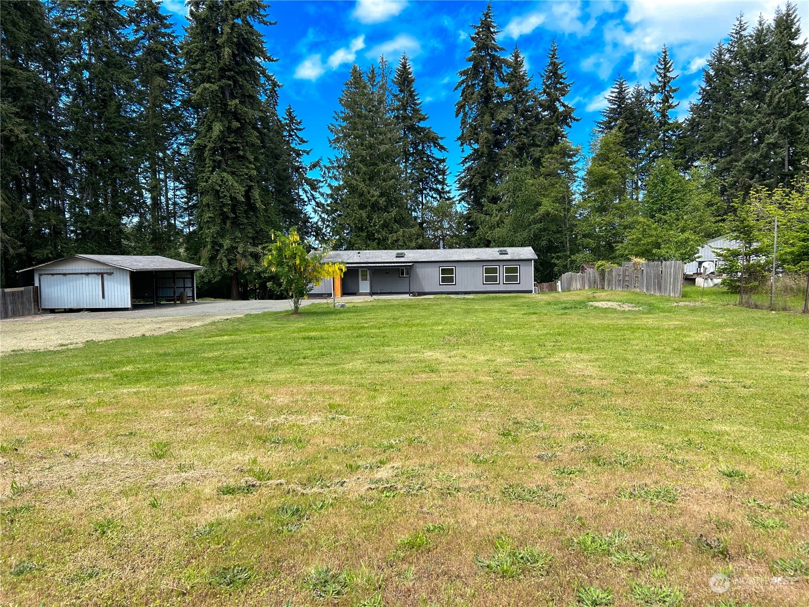 112 Levig Road Port Angeles, WA 98362 - Photo 34 of 37 a view of a swimming pool with an outdoor space and seating area