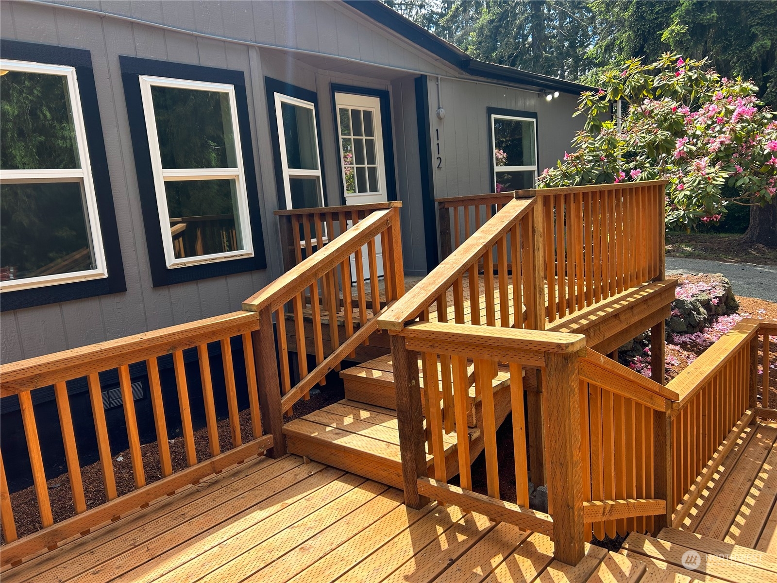 112 Levig Road Port Angeles, WA 98362 - Photo 5 of 37 a view of a house with staircase and wooden floor
