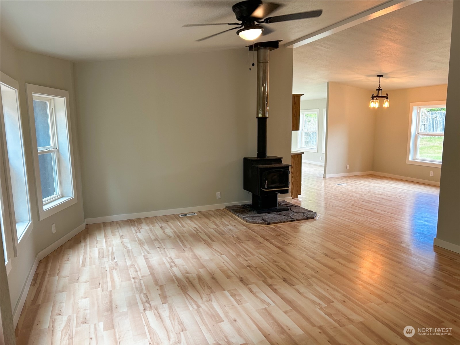 112 Levig Road Port Angeles, WA 98362 - Photo 6 of 37 a view of empty room with wooden floor and fan