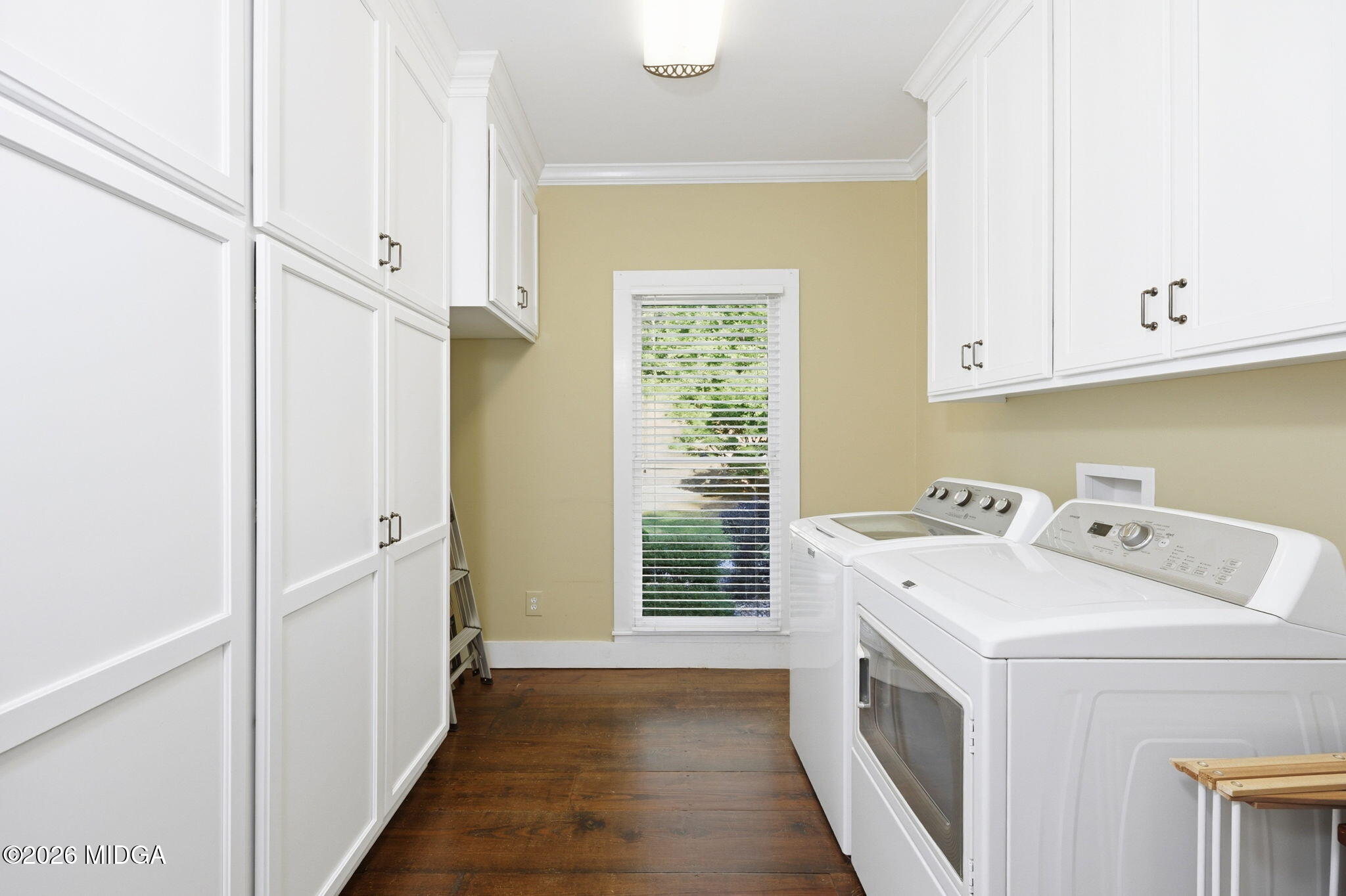 4686 Johnstonville Road Forsyth, GA 31029 - Photo 14 of 34 a utility room with dryer and washer