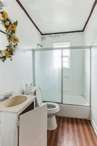 a kitchen with a stove and a refrigerator