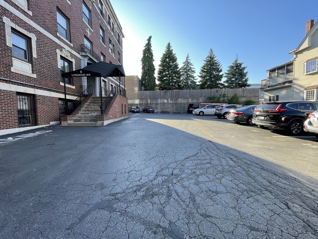 8 Langmaid Avenue, Unit 4 Somerville, MA 02145 - Photo 8 of 8 a view of a street with cars