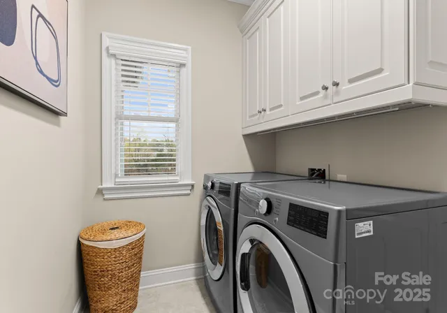 a bed room with a bed and a window