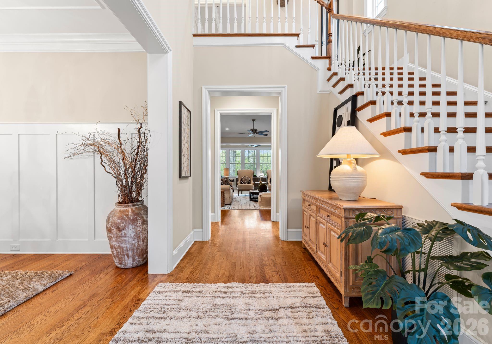 21311 Baltic Drive Cornelius, NC 28031 - Photo 3 of 39 a hallway with a black white checkered floor and next to a large window