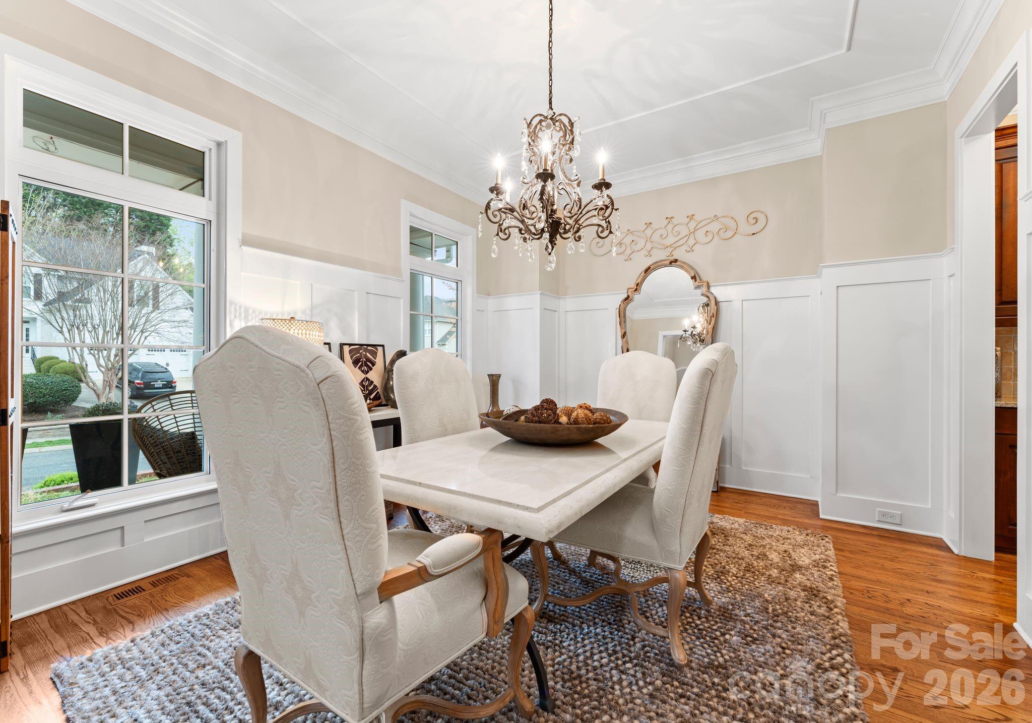 21311 Baltic Drive Cornelius, NC 28031 - Photo 7 of 39 a view of a dining room with furniture and chandelier