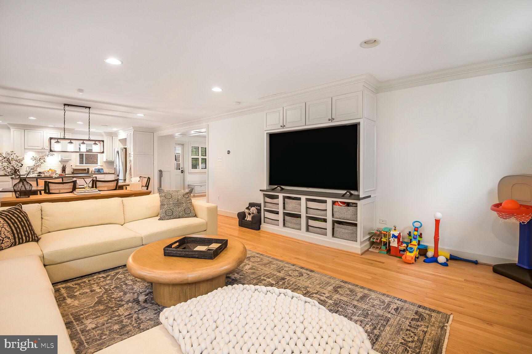 4403 Edgefield Road Kensington, MD 20895 - Photo 14 of 30 a living room with furniture and a flat screen tv