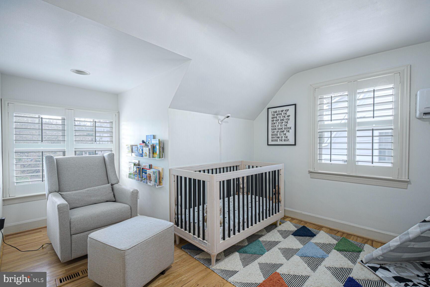 4403 Edgefield Road Kensington, MD 20895 - Photo 22 of 30 a bedroom with furniture and a window