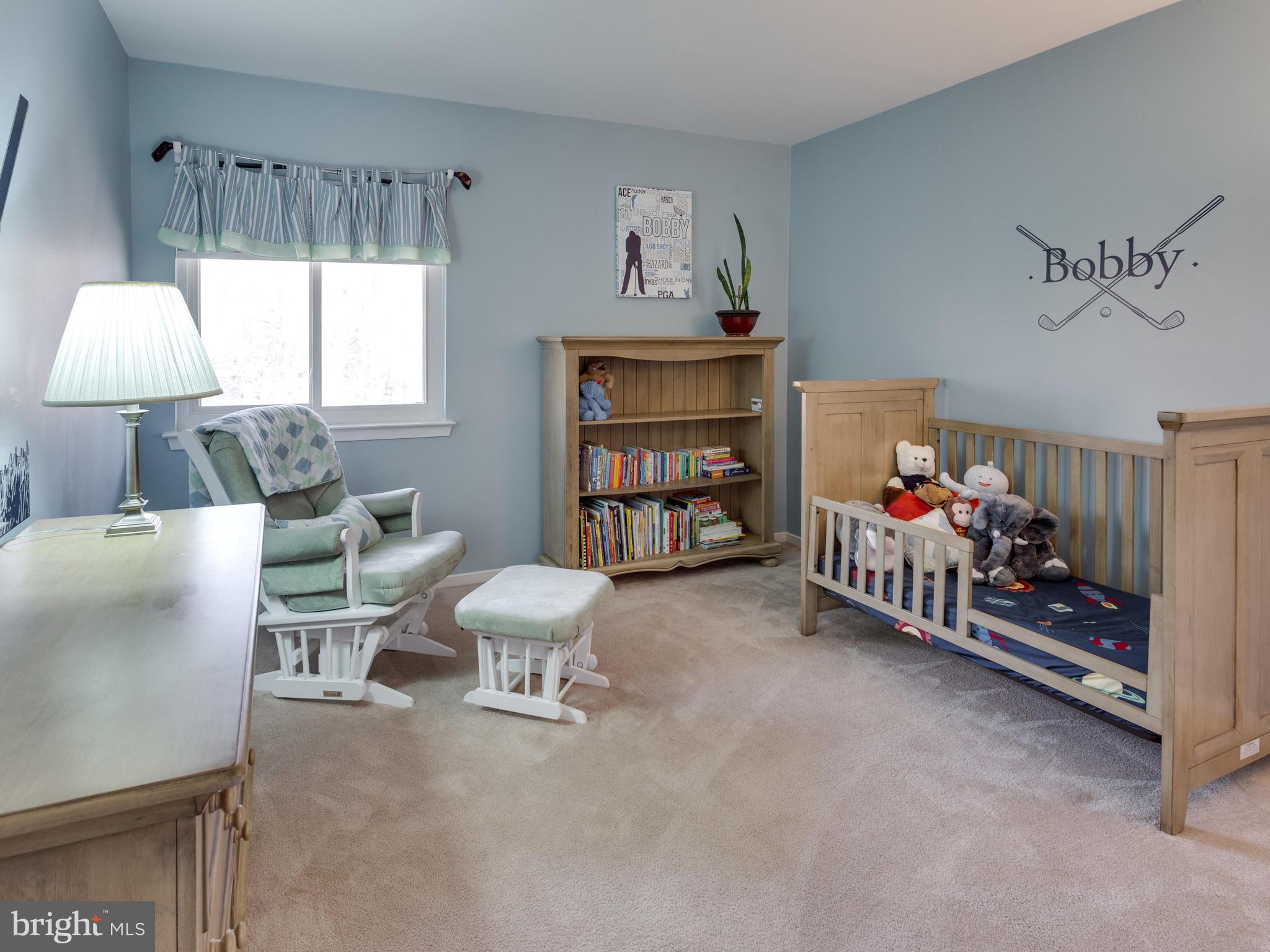1663 Bachan Court Reston, VA 20190 - Photo 14 of 29 a bedroom with furniture and a bed
