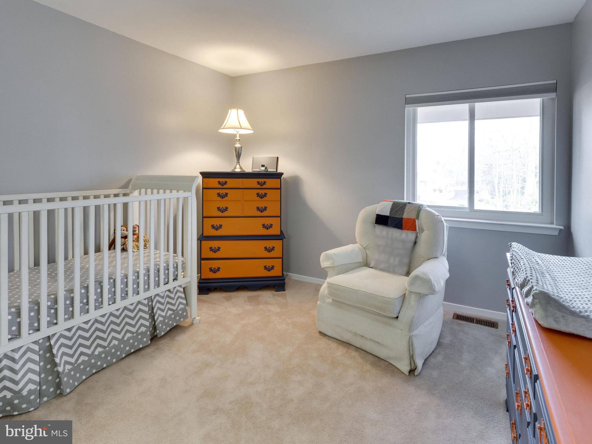 1663 Bachan Court Reston, VA 20190 - Photo 16 of 29 a bedroom with furniture and a window