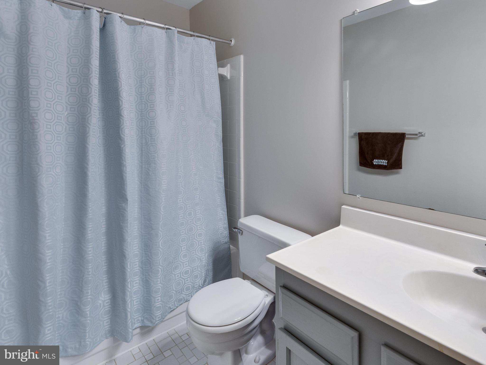 1663 Bachan Court Reston, VA 20190 - Photo 18 of 29 a bathroom with a sink and a toilet
