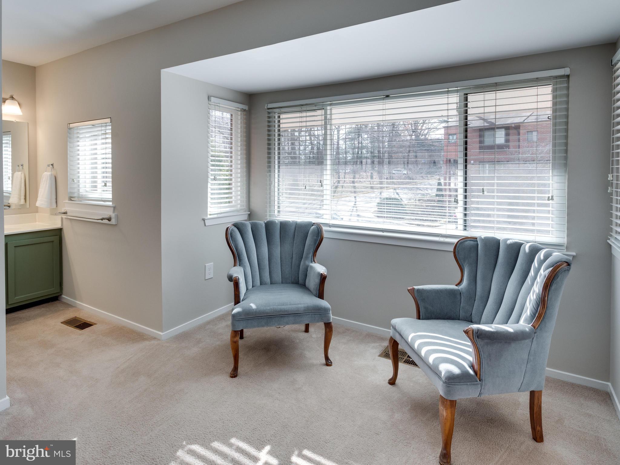 1663 Bachan Court Reston, VA 20190 - Photo 21 of 29 a living room with furniture and a window