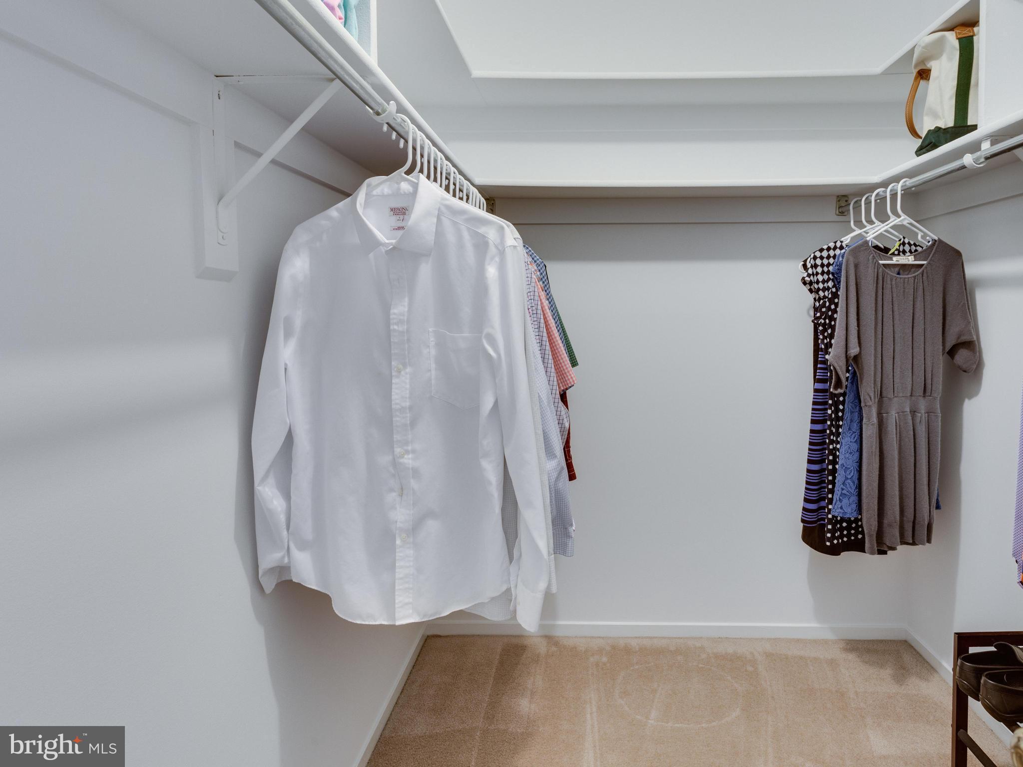 1663 Bachan Court Reston, VA 20190 - Photo 23 of 29 a view of walk in closet with clothes