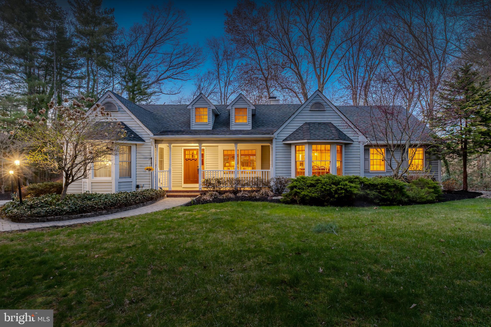 124 Pitman Downer Road Sewell, NJ 08080 - Photo 30 of 71 a front view of a house with a yard