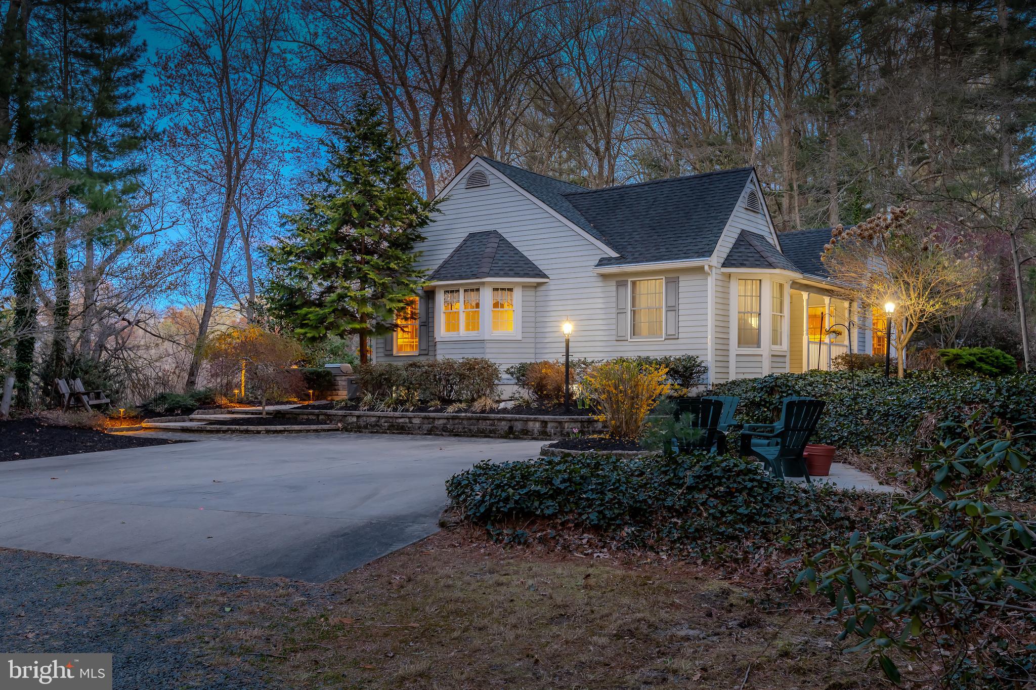124 Pitman Downer Road Sewell, NJ 08080 - Photo 34 of 71 a front view of a house with garden