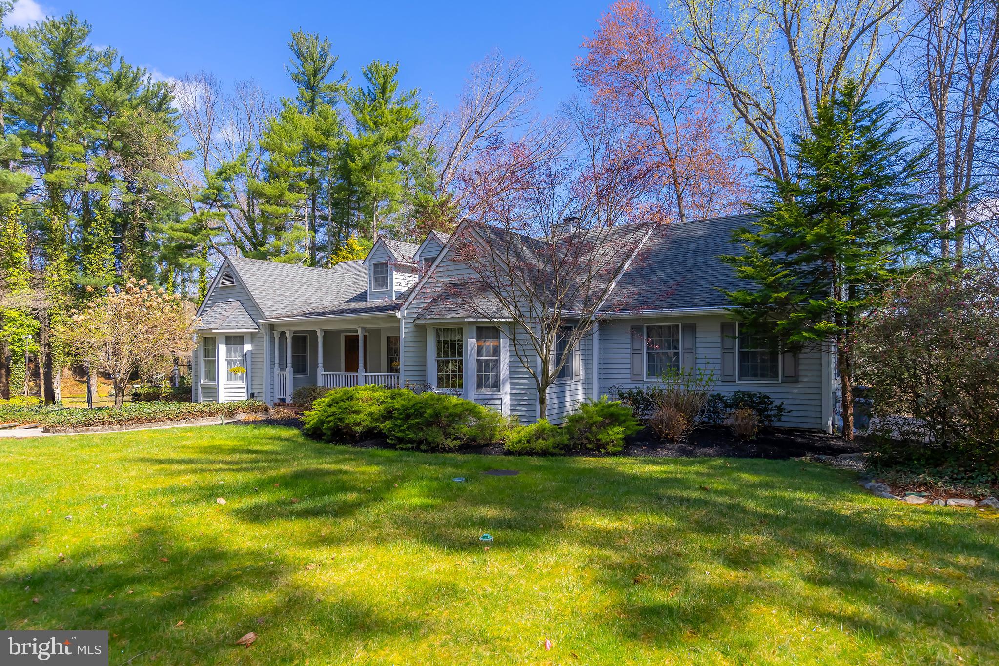 124 Pitman Downer Road Sewell, NJ 08080 - Photo 43 of 71 a front view of a house with a garden