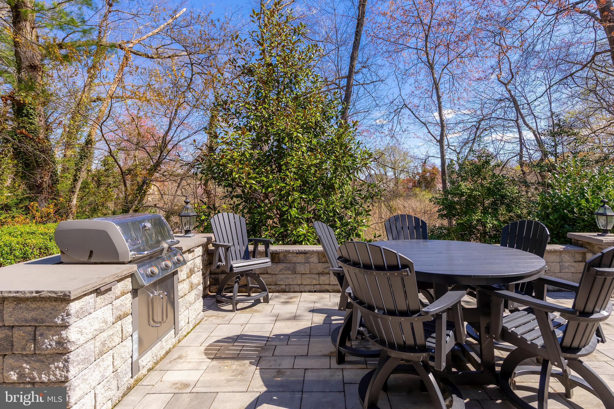 124 Pitman Downer Road Sewell, NJ 08080 - Photo 47 of 71 a view of a patio with table and chairs and a barbeque