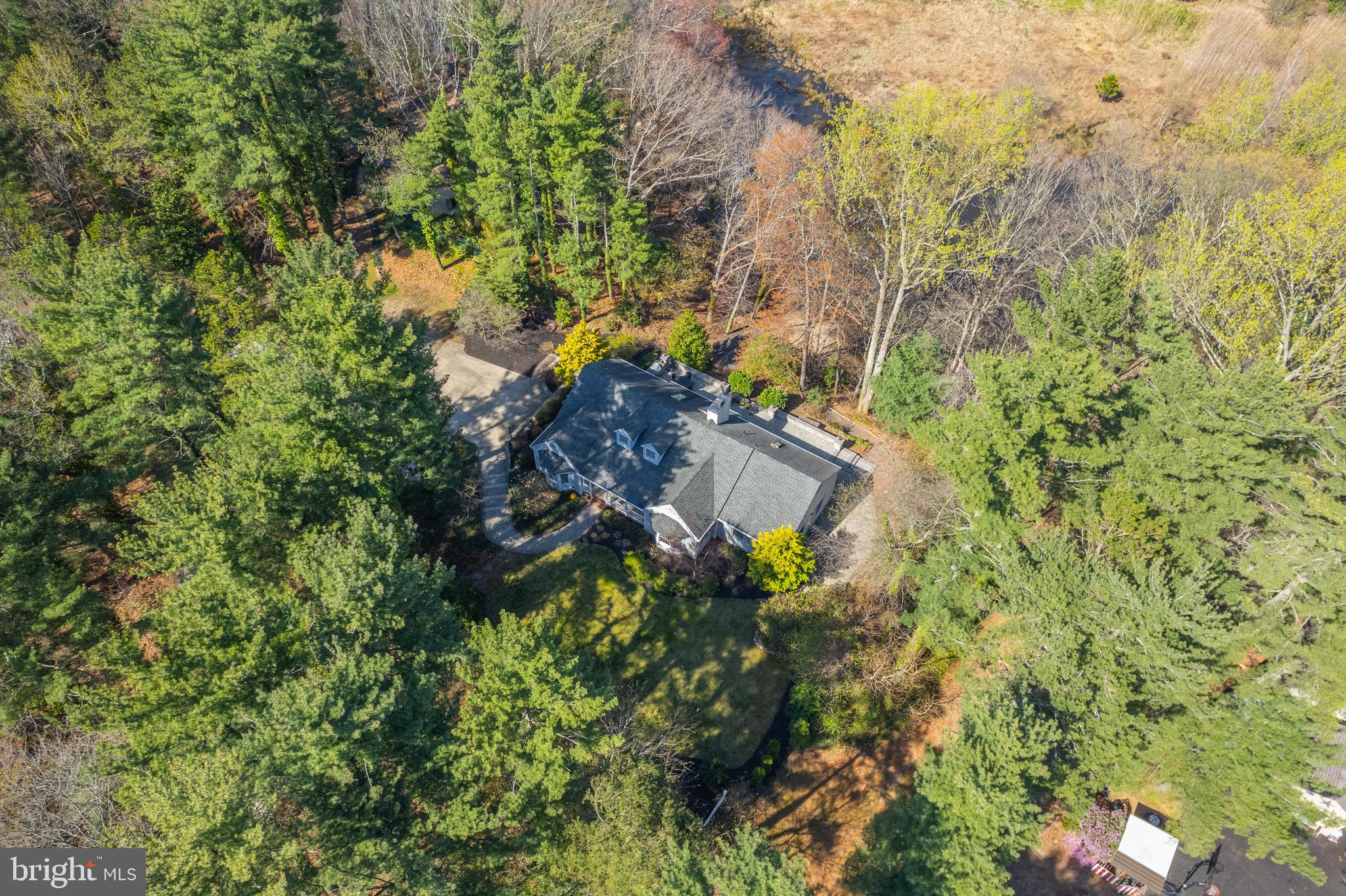 124 Pitman Downer Road Sewell, NJ 08080 - Photo 60 of 71 a backyard of a house with lots of trees
