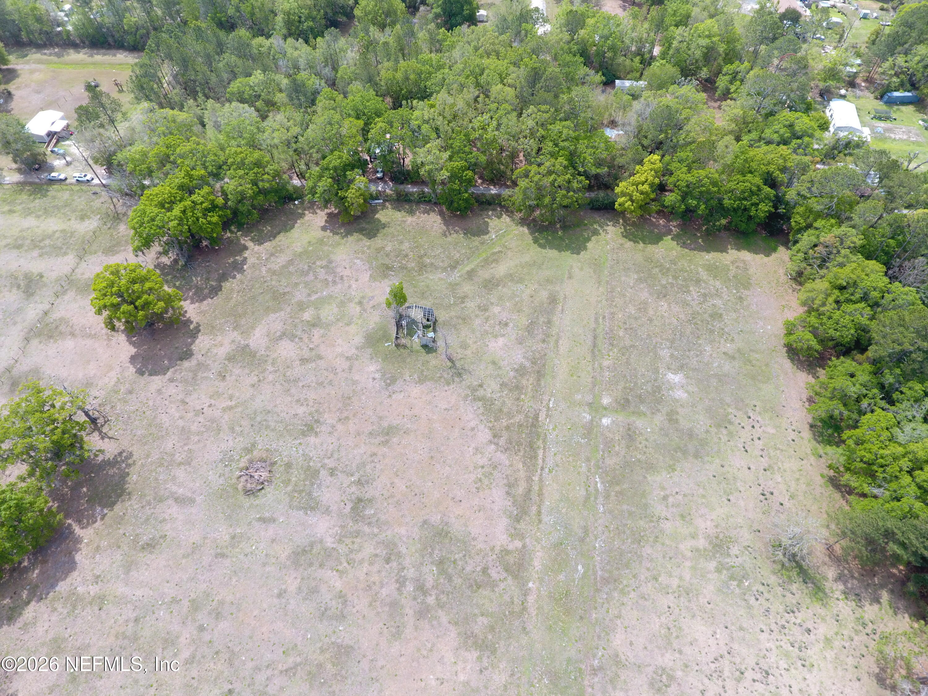 Tbd Northeast 163rd Street Starke, FL 32091 - Photo 3 of 10 a view of a lake with a forest