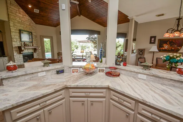 a kitchen with sink and stove