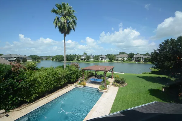 a view of a lake with a garden