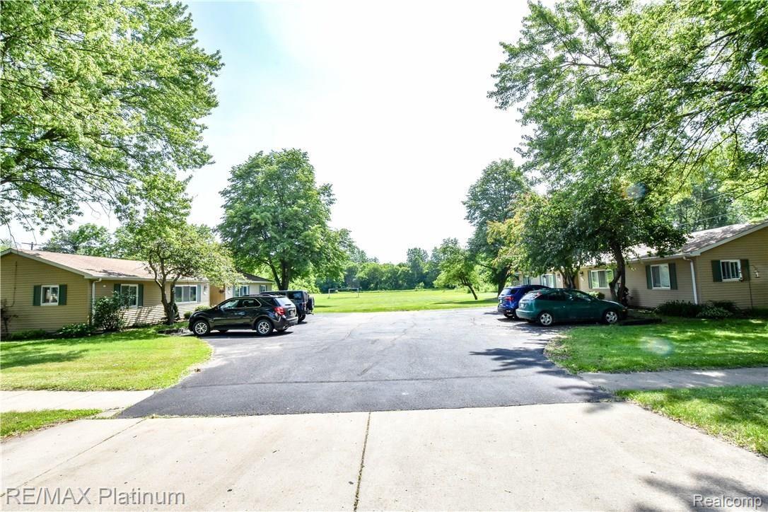 501 Fowler Street Howell, MI 48843 - Photo 1 of 27 TWO DUPLEXES SOLD TOGETHER...4 UNITS