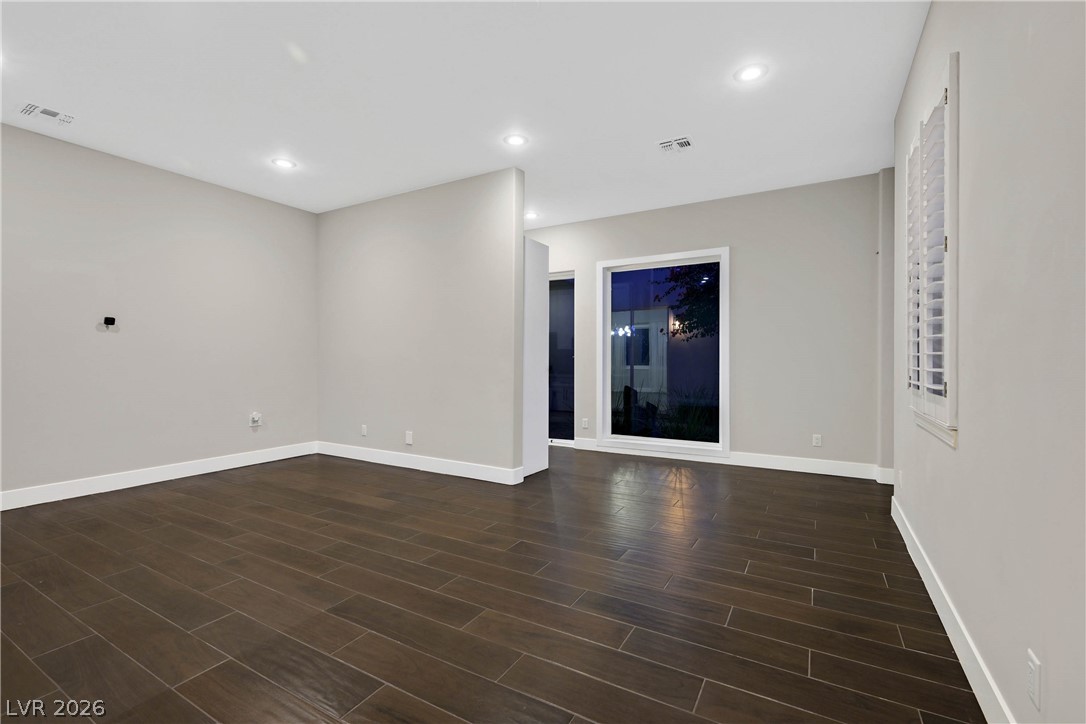 6 Rue Du Ville Henderson, NV 89011 - Photo 51 of 99 This versatile space features rich tile flooring and abundant recessed lighting, ready for your personal touch.
