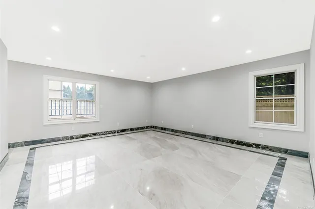 a view of a room with windows