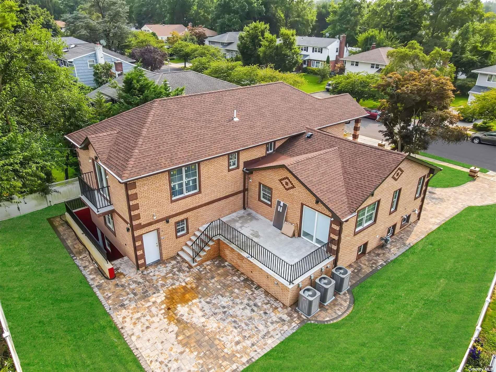 22 Solar Lane Albertson, NY 11507 - Photo 2 of 21 an aerial view of residential houses with yard