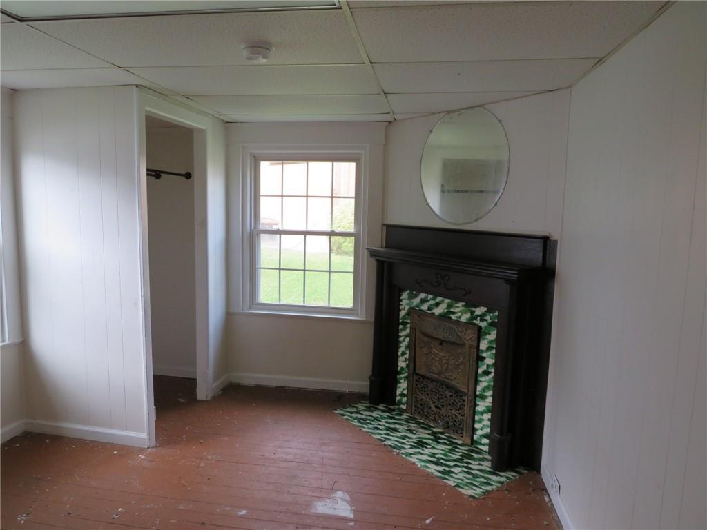 802 Howard Street Monongahela, PA 15063 - Photo 21 of 43 an empty room with windows and fireplace