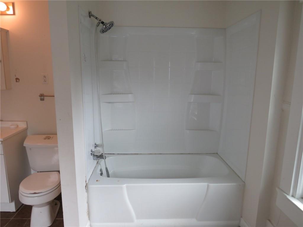 802 Howard Street Monongahela, PA 15063 - Photo 34 of 43 a bathroom with a toilet and a bathtub