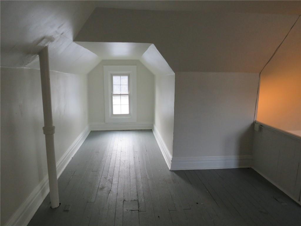 802 Howard Street Monongahela, PA 15063 - Photo 40 of 43 an empty room with wooden floor and windows