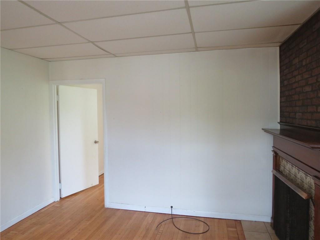 802 Howard Street Monongahela, PA 15063 - Photo 8 of 43 a view of empty room with wooden floor