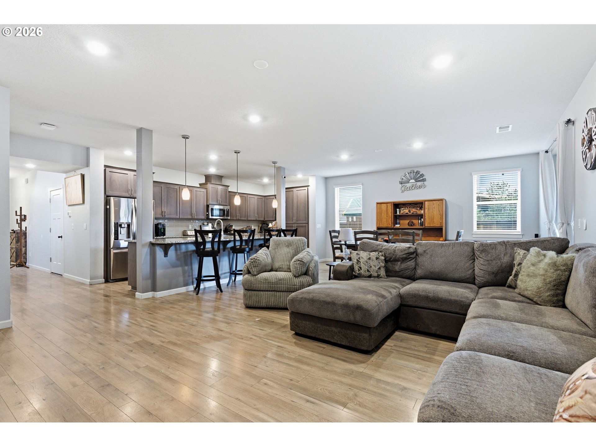 476 Southwest 15th Avenue Canby, OR 97013 - Photo 22 of 41 a living room with furniture and kitchen view