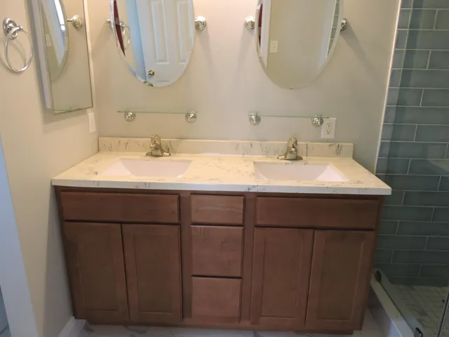 a bathroom with a sink and a mirror